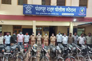 pandharpur city police seized 12 mobiles along with 10 motorcycles