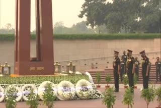 chief-of-defence-staff-cds-general-bipin-rawat-army-chief-general-manoj-mukund-naravane-pay-tribute-at-national-war-memorial-on-infantry-day