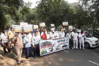 Rajdhani Parivahan Panchayat protest against government policies at Rajghat