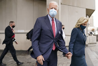 Biden casts early vote