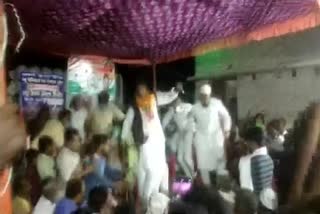 Congress candidate from Jale assembly seat Mashkoor Ahmad Usmani falls as the stage collapsed