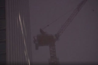 Wind spins crane high above Manhattan