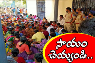 Flood victims protest in front of Uppal GHMC office in hyderabad