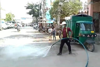 North Delhi Municipal Corporation is spraying water on roads