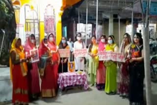 Women take out candle march