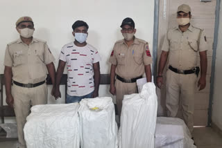 Badarpur police arrested an accused for liquor smuggling