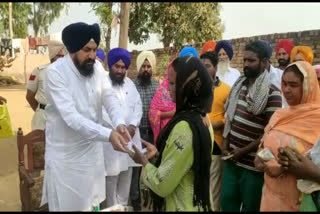 Poisonous alcohol: Manjit Singh Manna arrives to help the families of the deceased