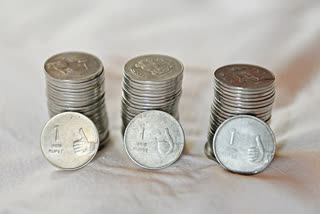 Rupee hits over 10-week low, slumps 35 paise against USD