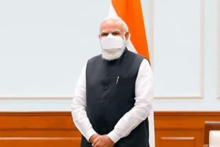 PM Narendra Modi wears masks made by the Family of Davangere