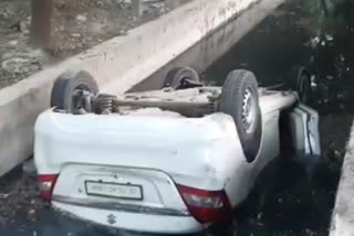 uncontrolled car fell into drain in noida