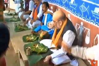 Amit Shah shares lunch with tribal community