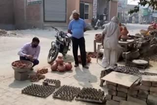 potters are facing financial problem due to less sale of lamps in palwal