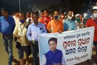 Bhadrak journalists join candle march for journalist prabir pradhan's demise