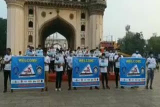 Traffic police conducting  2K run at Charminar in hyderabad