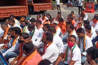 bjp leaders protest in front of siricilla collectorate