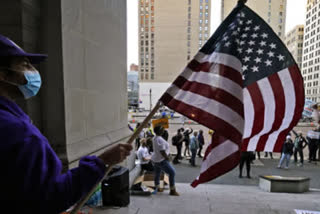 Armed men arrested ouside counting centre in Philadelphia were trying to deliver fake ballots: Reports