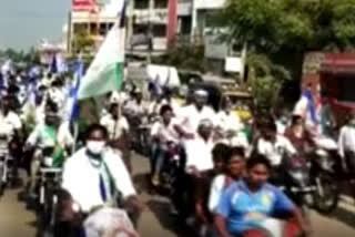 ycp leaders and followers held bike rally in vijayawada for formation of bc corporations