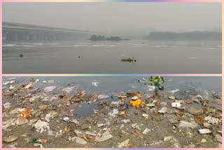 Water pollution in Delhi, dirt and white foam in Yamuna