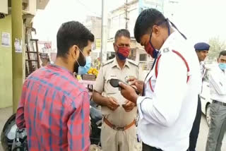 Rewari Police appeal wear mask and cut challan for not wearing mask