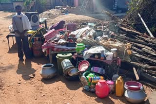 Mother and daughter breaks the hut of a poor family