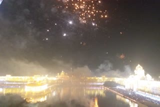 Sachkhand Sri Harmandir Sahib lit up with lanterns and fireworks