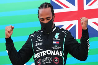 Britain’s Lewis Hamilton took a record-equalling seventh world championship