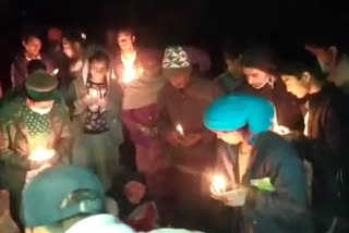 candle march kinnaur