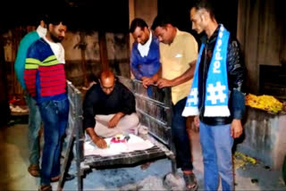 Young man in Gujrat celebrates birthday in cemetery on kali chaudas