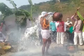 Priest bathed in boiling milk