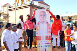 anointing of milk to bs yadiyurappa photo