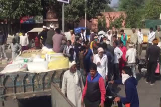 farmers blocked loharu road due to delay in millet purchase