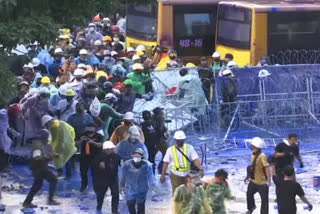 Thai protesters, police clash as MPs mull charter change