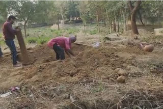 Woman's body exhumed after family complaint