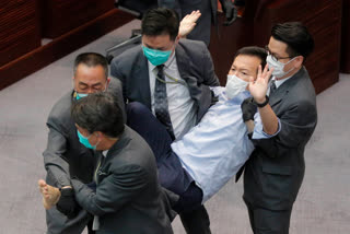 Former Hong Kong lawmakers who disruFormer Hong Kong lawmakers who disrupted session arrestedpted session arrested