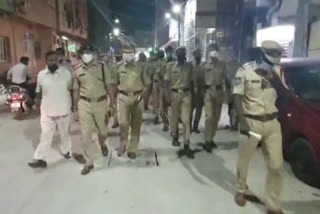 Police conducting a flag march in the old city in hyderabad