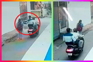 street crime increase in delhi scooty rider snatch mobile from a girl in usmanpur cctv footage out