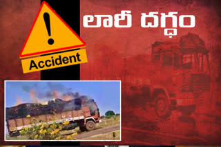 Burning lorry going with a load of grass On the outskirts of Satwar in Sangareddy District