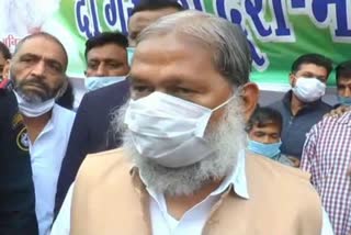 haryana home minister anil vij distributed mask in ambala