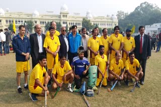 hockey match between students and former players at lucknow university