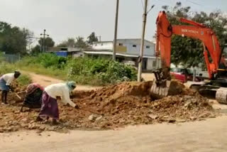 Road widening works have been carried out without removing electric poles in somandepally at ananathapur district