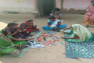 Women making lamps