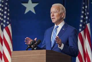 Biden declares his administration 'ready to lead the world'