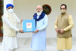 PM Modi releases book on life and ideals of Guru Nanak Dev