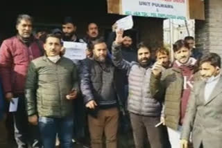 power employees protest against privatization in pulwama jammu and kashmir