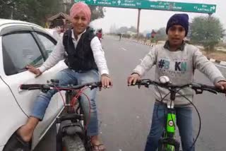 children came with bicycles to participate in the farmers protest jind