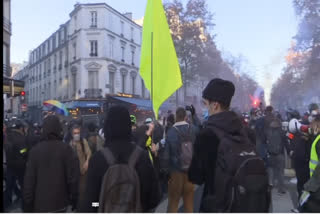 Scuffles at protest over security police bill in Paris