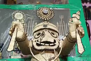 an idol of Lord Jagannath with matchsticks