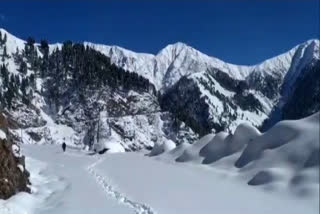 Jammu & Kashmir: Snow clearance operation underway at Mughal Road in Rajouri district.