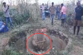 a tractor faulty into an old borewell