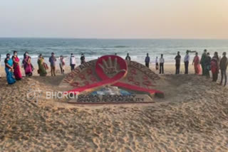 Sudarsan Pattnaik creates sand art to mark World AIDS Day